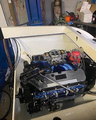 Freshly rebuilt blue marine V8 with polished valve covers